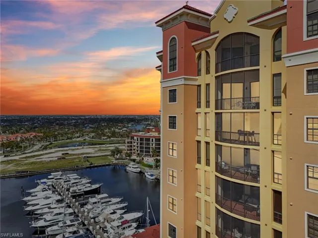 Outdoor building at dusk featuring a water view