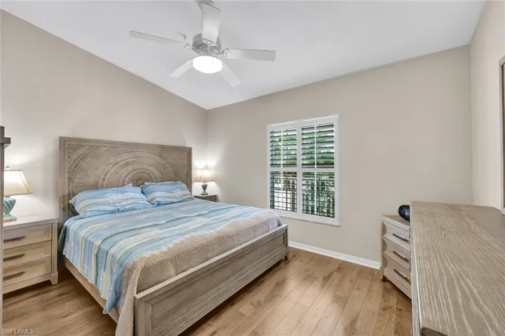 Bedroom with light wood-type flooring and ceiling fan