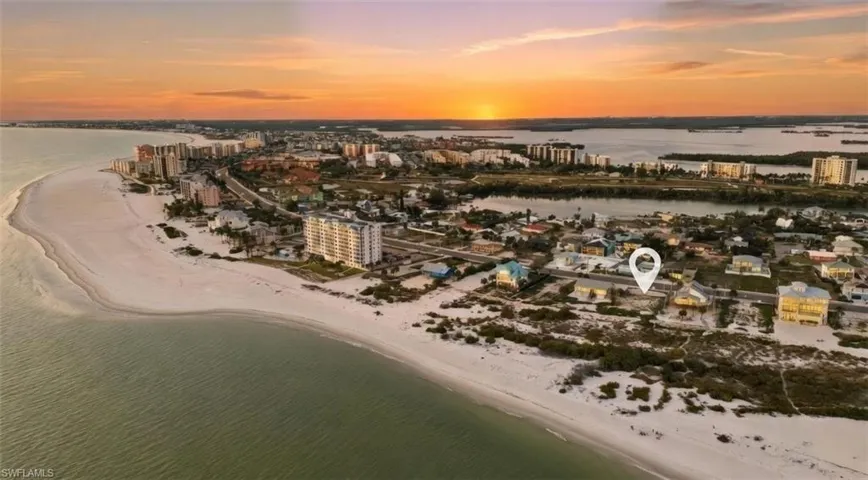 View of urban area with expansive beach