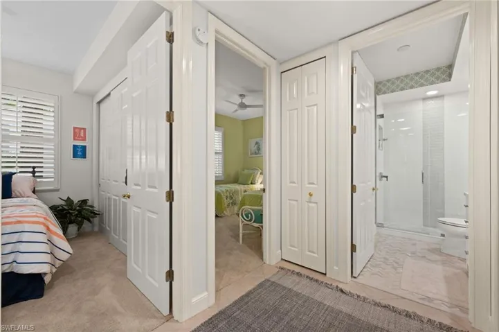 Guest wing with two bedrooms, bath, and storage