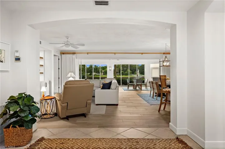 Arched entryway opening to main living areas