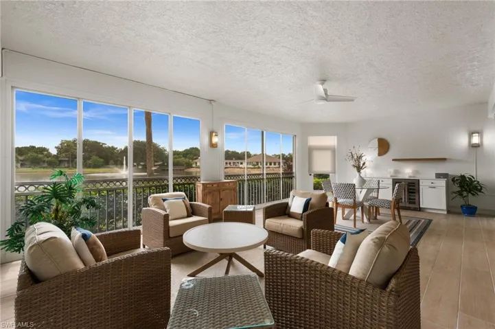 Lanai living with a wet bar and beverage cooler