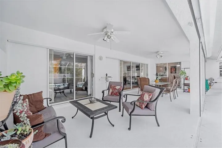 View of patio / terrace featuring ceiling fan and an outdoor hangout area