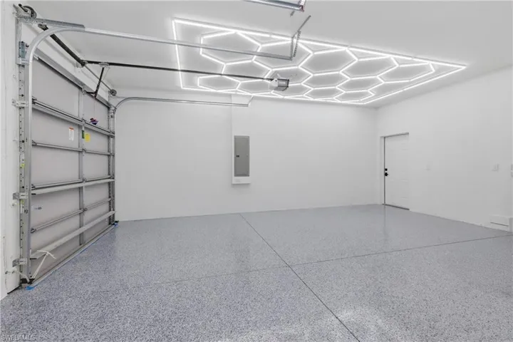 Garage featuring electric panel
