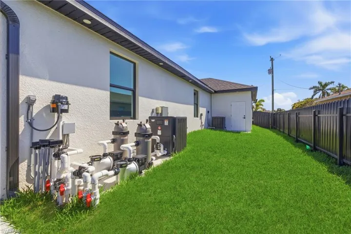 View of fenced backyard