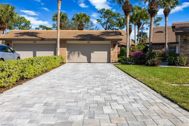 View of front of property featuring a front yard