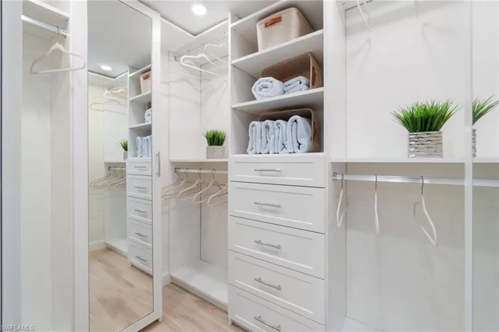Custom primary walk-in closet