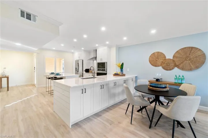 The spacious, open floor plan allows for a dining zone right off of the kitchen