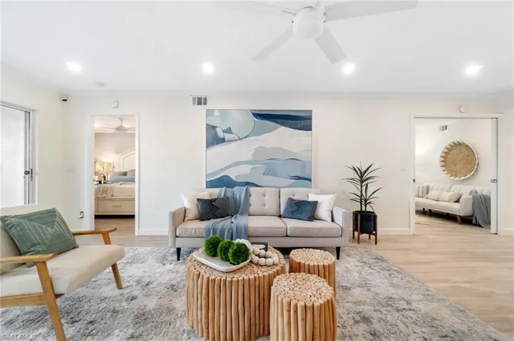 Main living area showing the proximity of the den and primary suite