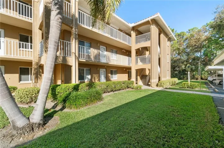 View of property. Unit is on bottom right.  Desirable End Unit on the Ground floor.