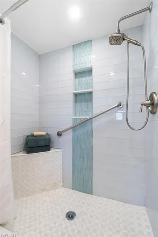 Bathroom featuring walk in shower