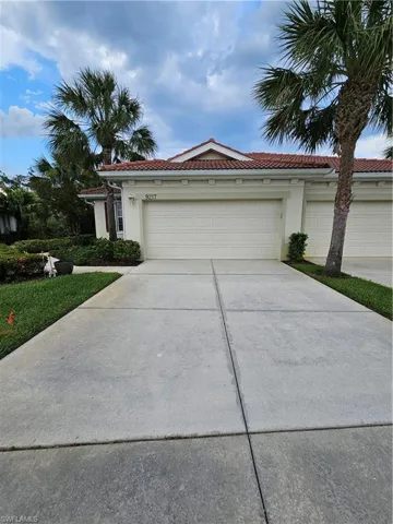 View of front of home with a garage
