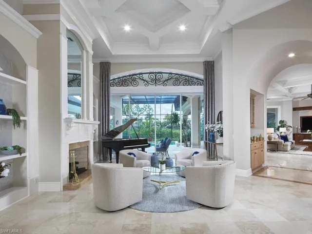 Enter through the foyer into the formal living area; you will be captivated by this home's details.