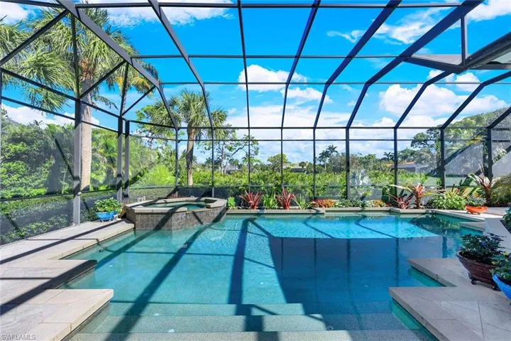 Swim day or night, this home offers so much outdoor privacy!