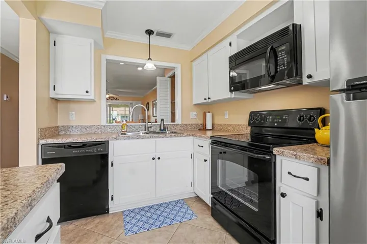 Updated Kitchen featuring pass thru to the dining area.