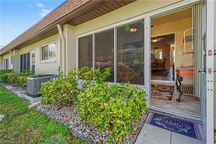 Back door leading into the sunroom/lanai.