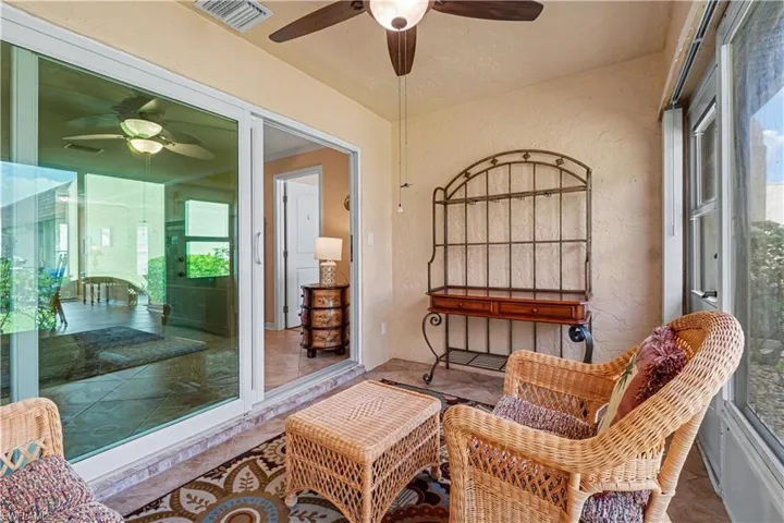 The lanai has been turned into a Sunroom with ac/heat added and a impact slider.
