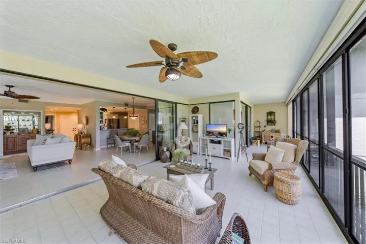 Florida Room looking into Living room, dining room and kitchen