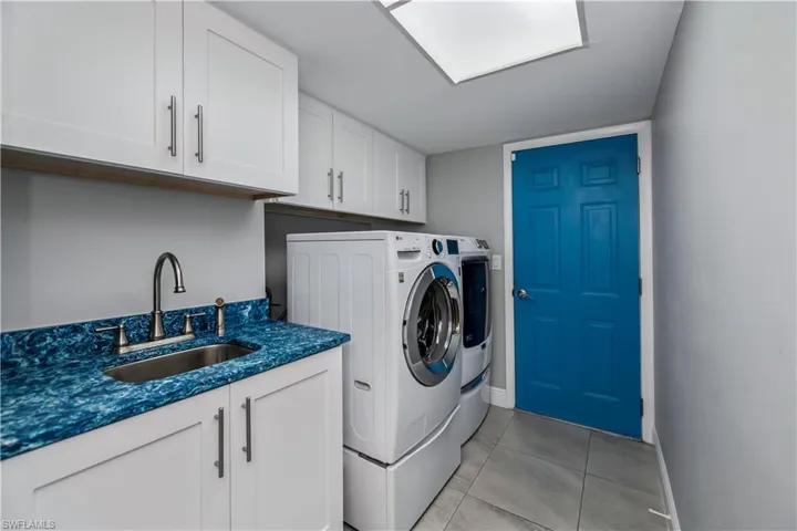 Huge Laundry with Quartz counter tops