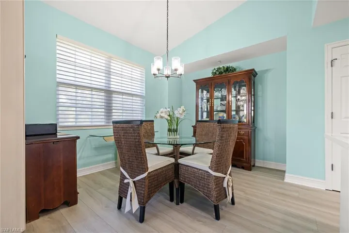 Dining space with vaulted ceiling