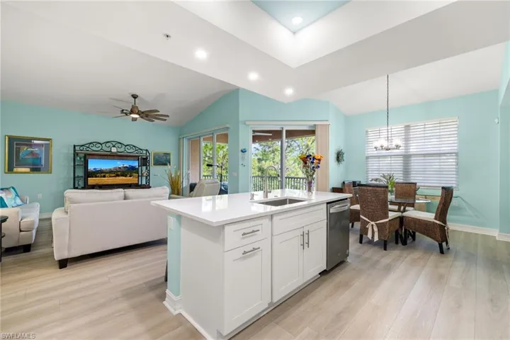 Great room is so open and even has vaulted and tray ceilings
