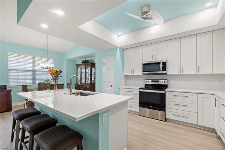 Kitchen completely updated in 2021.  Beautiful cabinets, counters, appliances and flooring.