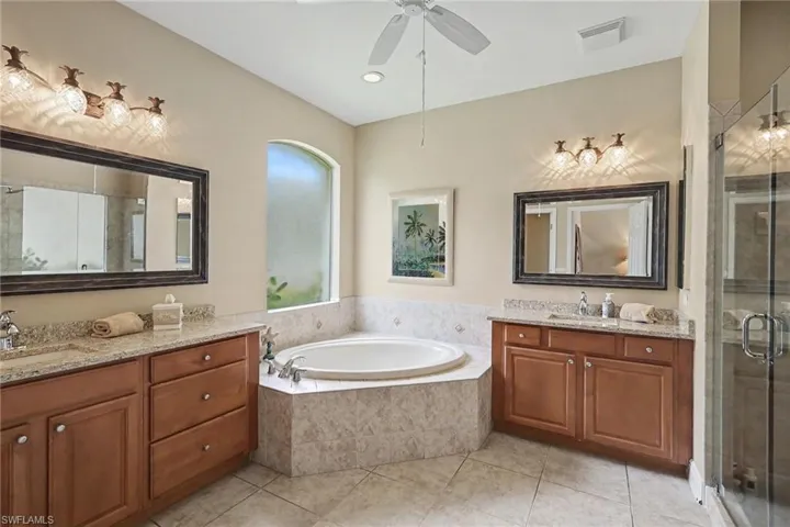 Master Bath has a Tub between the Vanities!