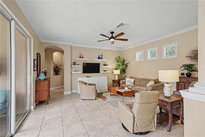 Sliders open the Living Room up to the Pool!