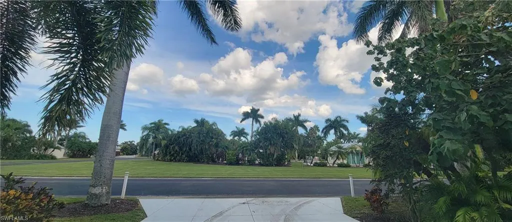 Common grassy area directly across the street