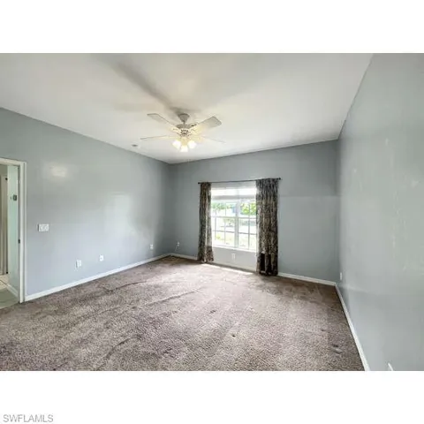 Blinds & Window Treatments stay with property.