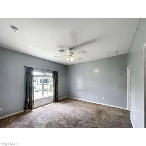 Blinds & Window Treatments stay with property.
