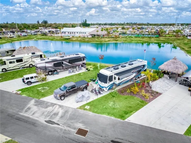 Aerial perspective of suburban area with a nearby body of water