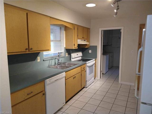137 W Lake DR, LEHIGH ACRES FL 33936