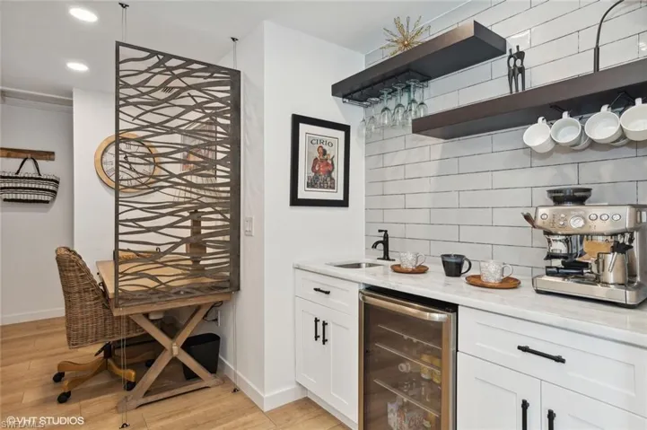 Espresso Coffee & Wine Bar with quartz countertops, beverage cooler, and white cabinets