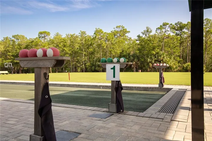 View of property's community featuring a yard