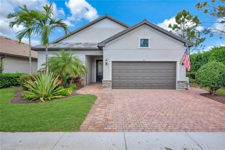 View of front with extended driveway