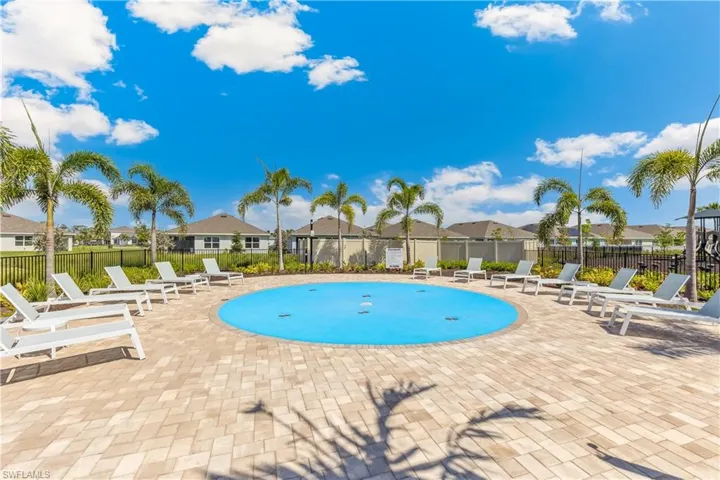 View of pool featuring a residential view and a patio area