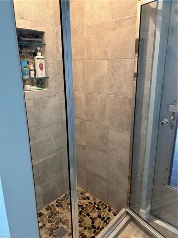 Bathroom featuring a stall shower