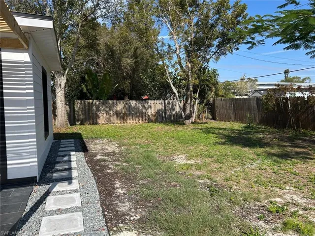 View of fenced backyard