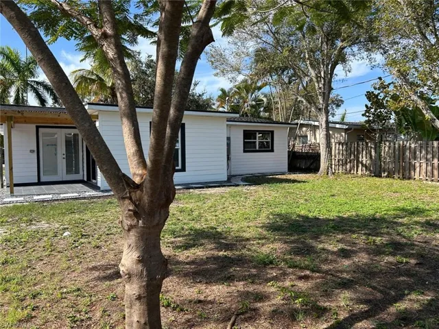 Back of house with french doors