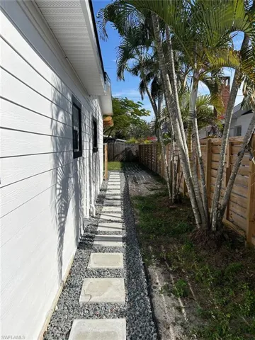 View of fenced backyard