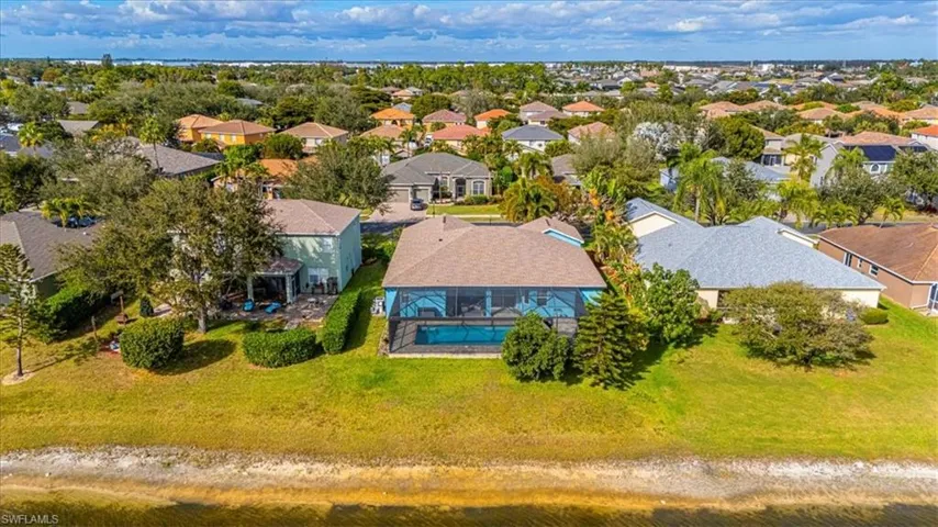 Aerial view of residential area with a nearby body of water