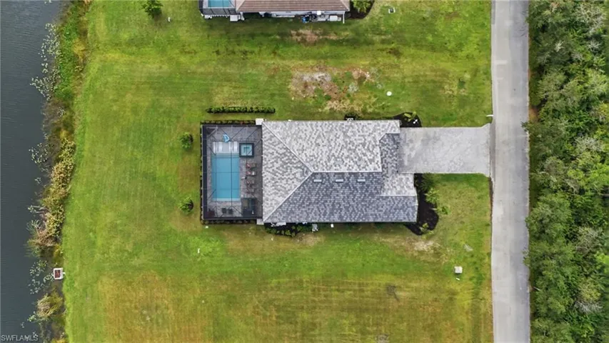 View of subject property featuring a nearby body of water