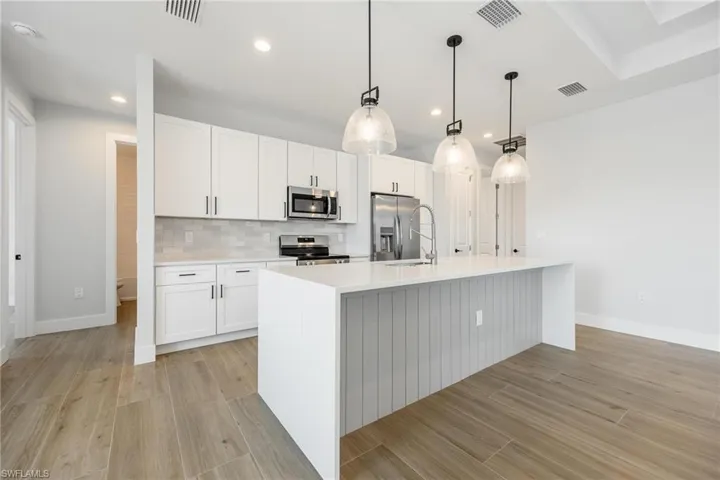 1032 NE 11th  AVE, Cape Coral, FL 33909