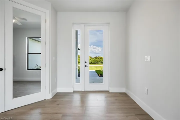 Front Door and French Doors to Den