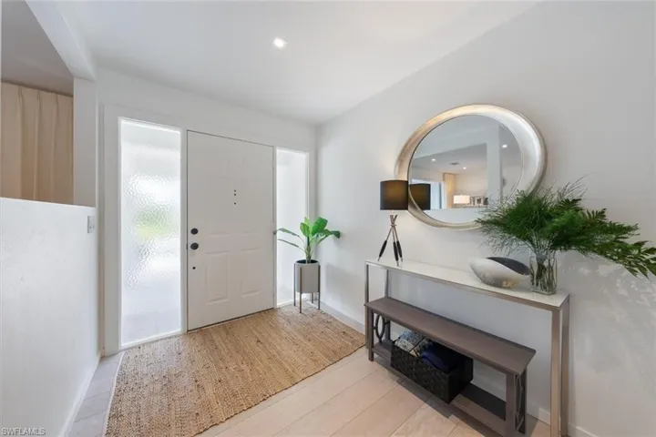 Entryway with light wood-type flooring