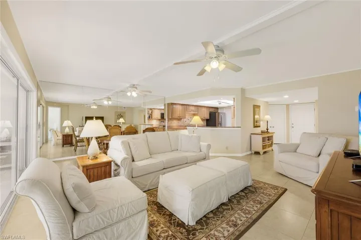 The living, dining, and kitchen areas flow together seamlessly.