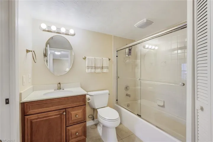 Guest bathroom with with tub/shower combination.