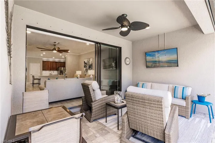 View of patio / terrace featuring an outdoor living space and ceiling fan