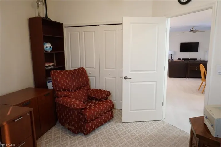 Guest bedroom featuring ceiling fan